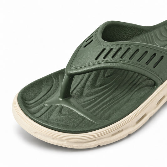 Close-up of the Toucantoes Richard olive slipper strap and soft footbed