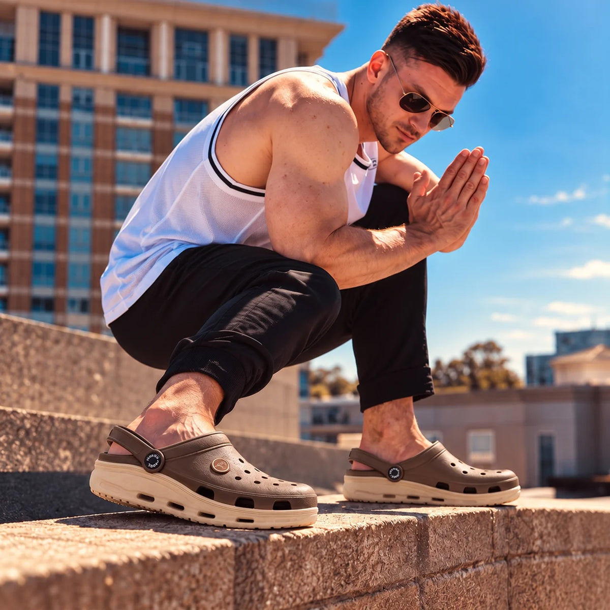 Man wearing Toucantoes Frank brown clogs, lifestyle shot
