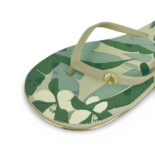 Toucan Toes women's flip-flop with green and cream floral print and gold logo detail