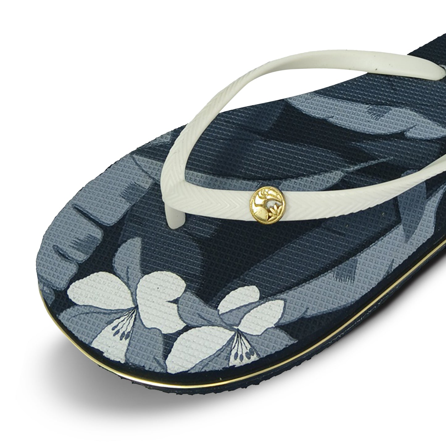 Toucantoes women's flip-flop with white straps, gold emblem, and floral print sole