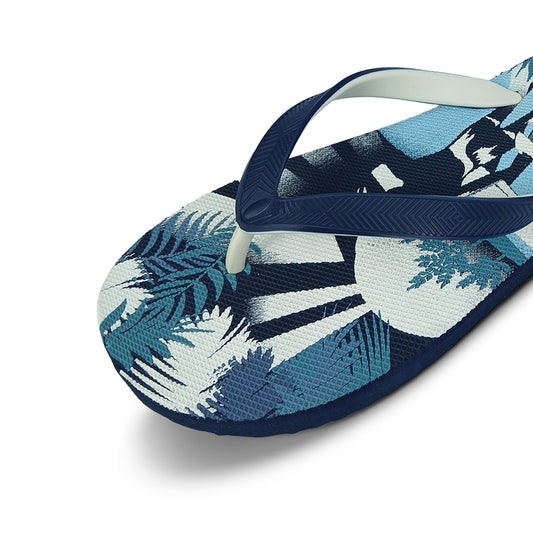 Toucan Toes blue flip-flop with tropical leaf print and textured navy straps