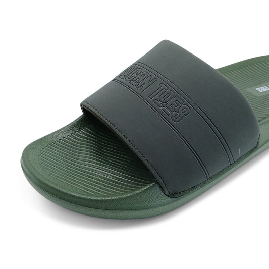 Close-up of green slide sandal with black strap embossed with 'DUNCAN TOES' logo