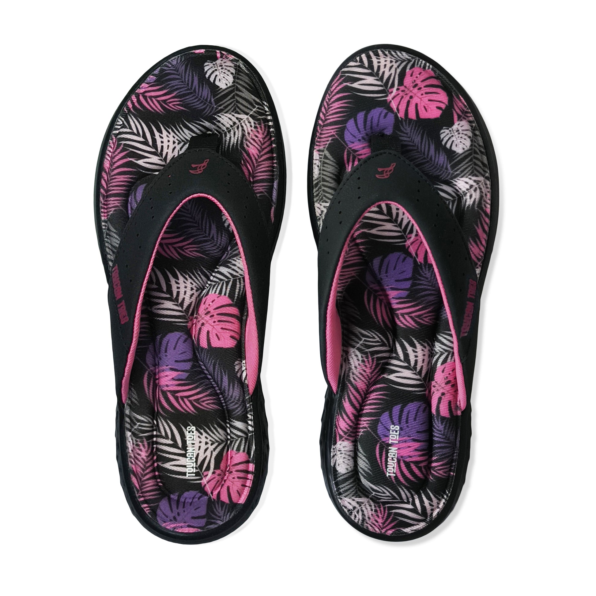 Toucantoes women's flip-flops with black straps and colorful tropical leaf print footbed