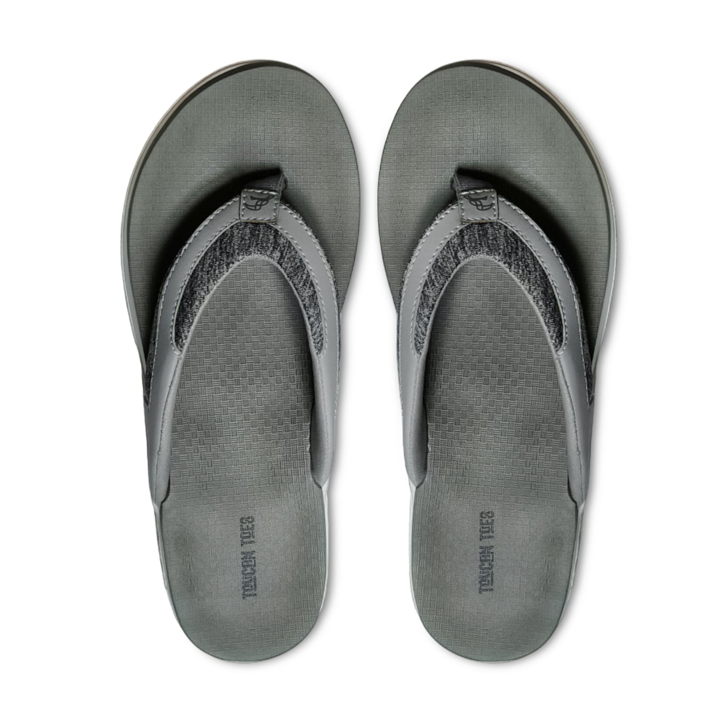 Gray Tough Yuca brand flip-flops with textured footbed and fabric straps, top view