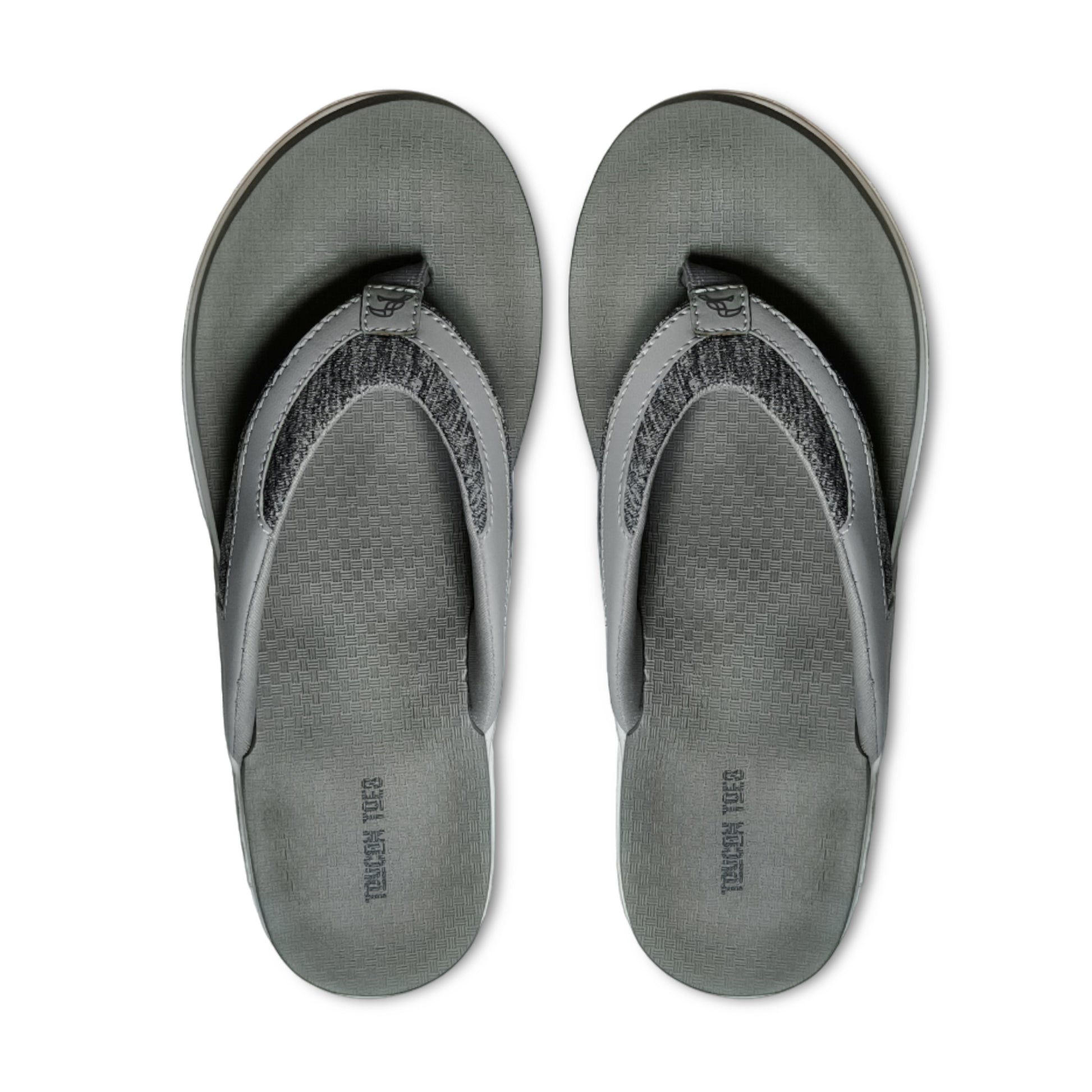 Gray Tough Yuca brand flip-flops with textured footbed and fabric straps, top view
