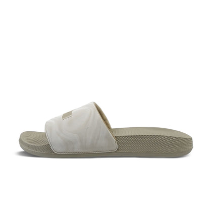 Toucantoes beige slide sandal with textured sole and marbled strap on white background