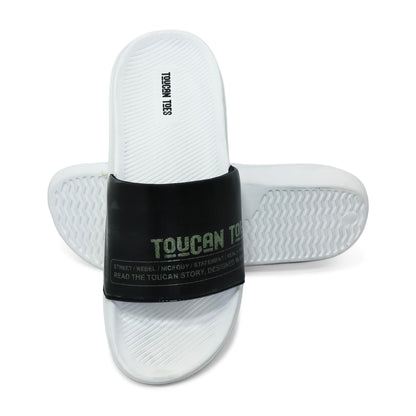 White Toucan Toes slide sandals with black wide strap featuring logo and text, textured footbed and sole
