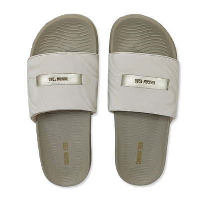 Toucantoes beige slides with textured footbed and marbled strap, premium casual footwear