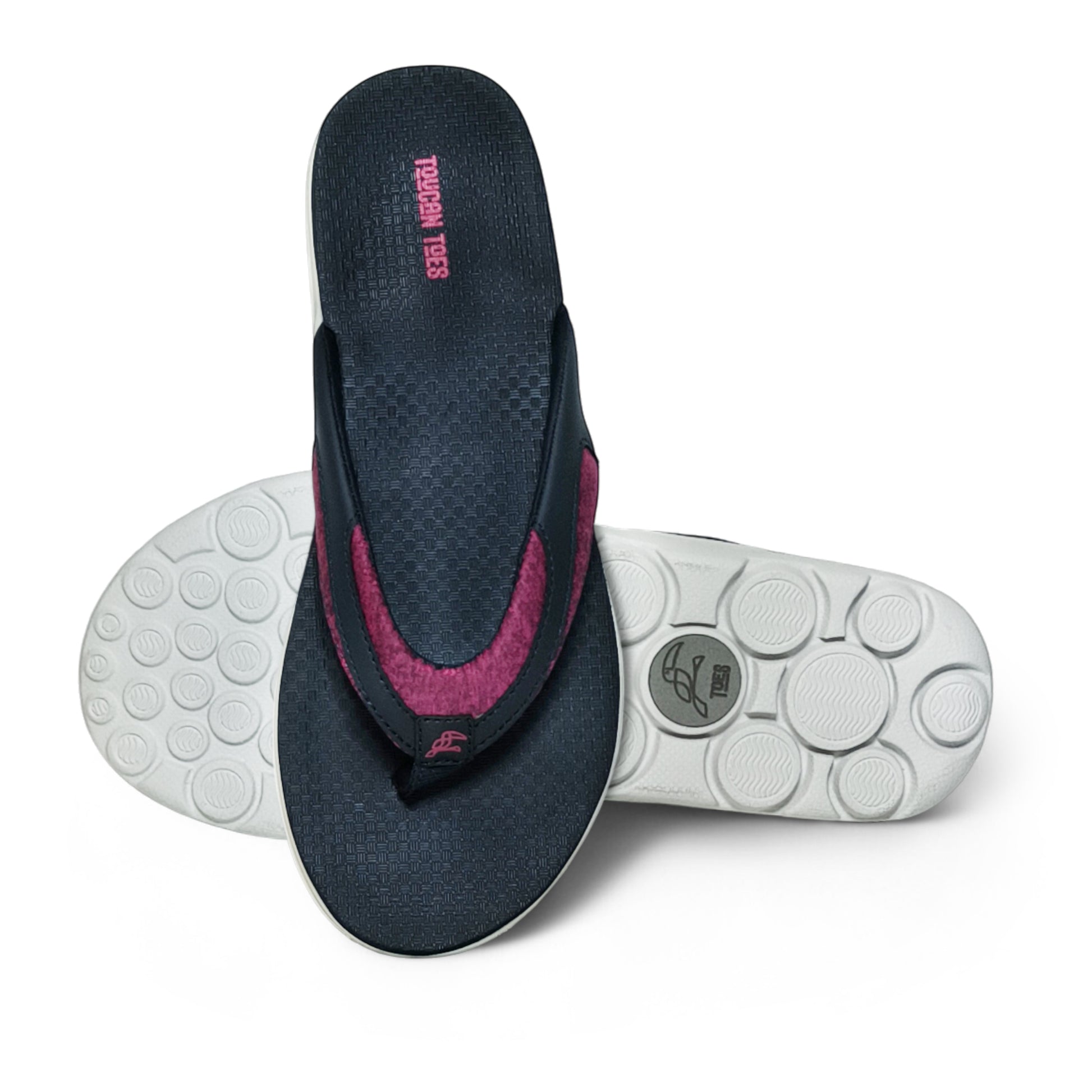 Black and burgundy Tough Ties flip flops with textured soles and circular tread pattern