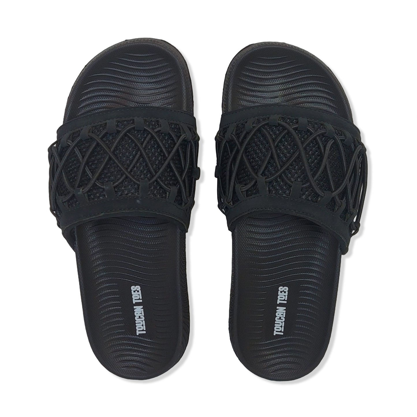 Toucantoes black slide sandals with textured footbed and crisscross strap design.
