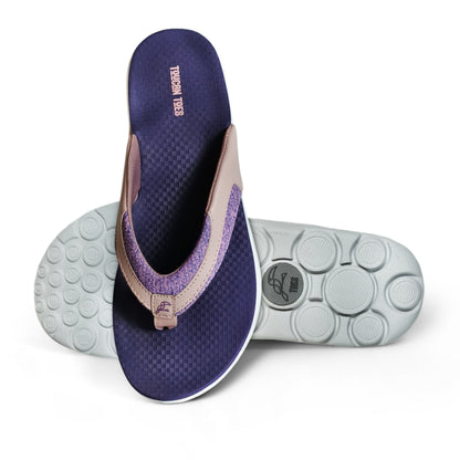 Purple and beige Tucan Toes flip-flops with textured soles and logo on a white background
