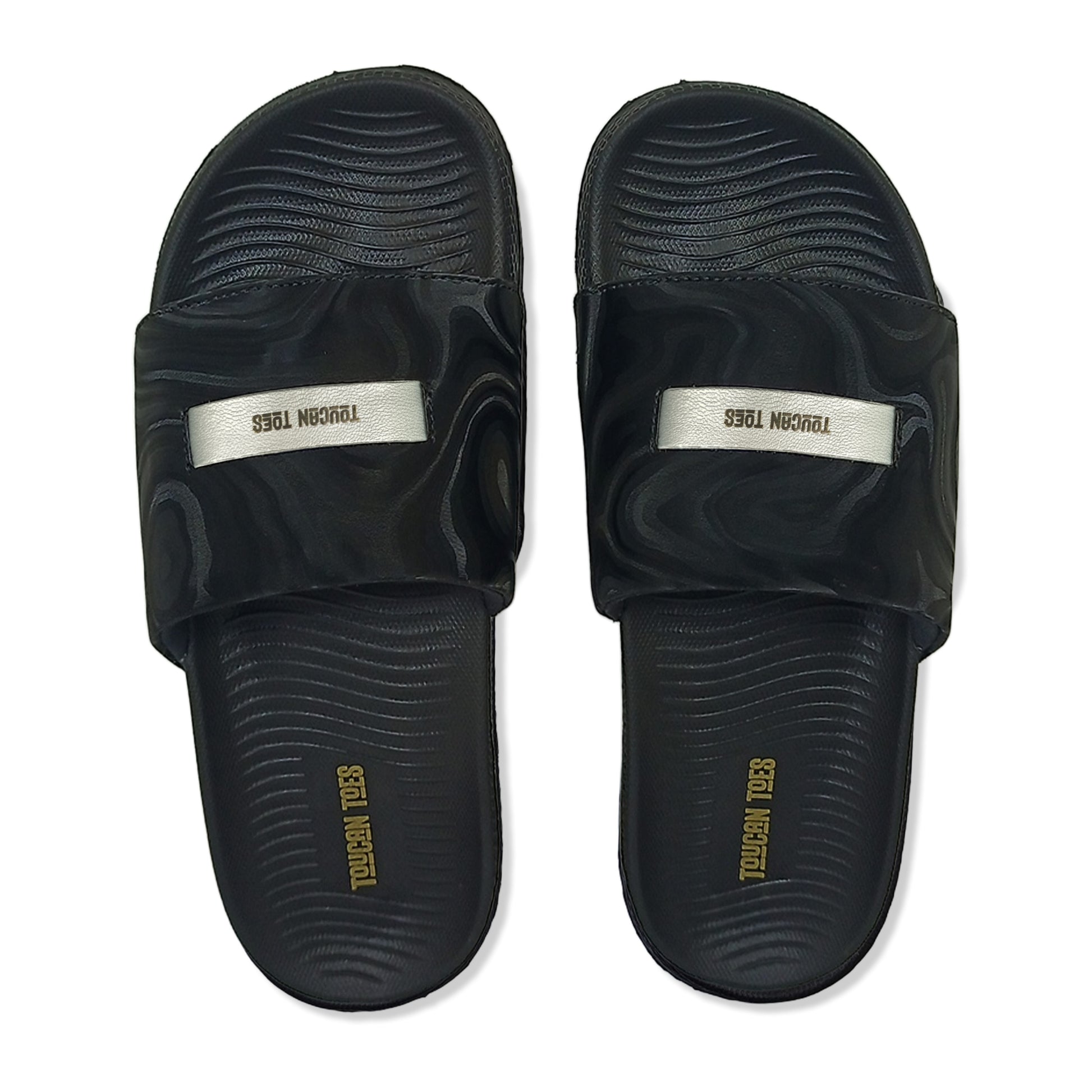 Toucan Toes black slide sandals with textured soles and logo straps, stylish durable footwear
