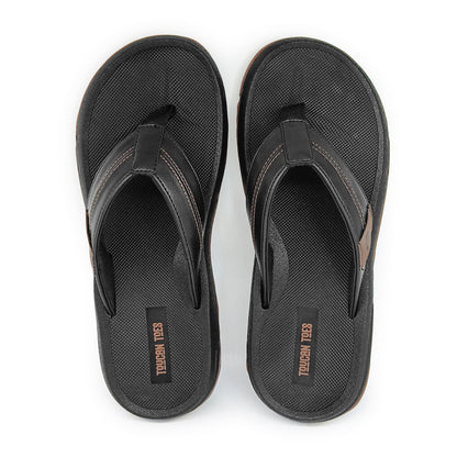 Pair of black Toucan Toes flip-flop sandals with textured footbed and leather-like straps