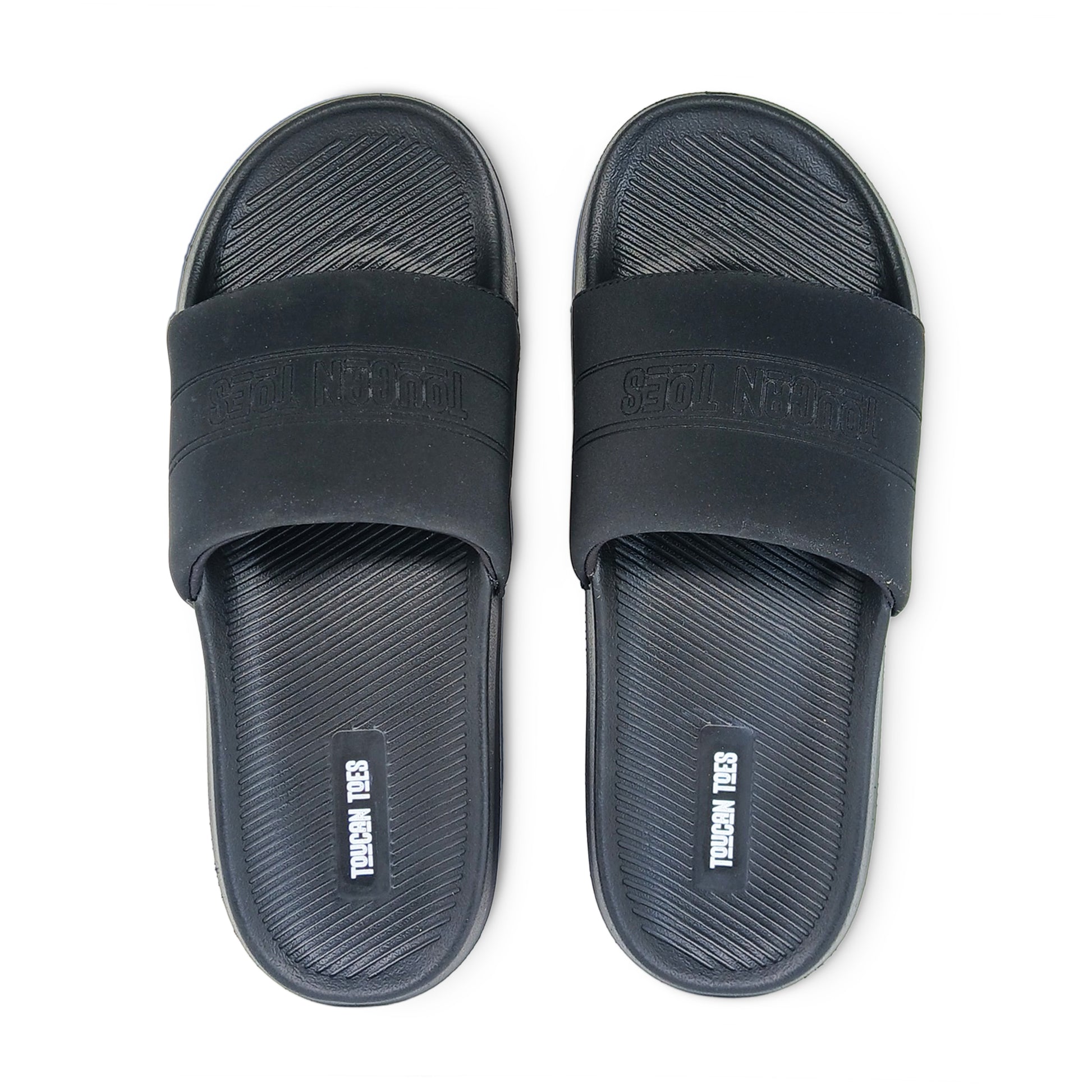 Pair of black rubber slide sandals with textured footbeds and embossed Toucan Toes logo
