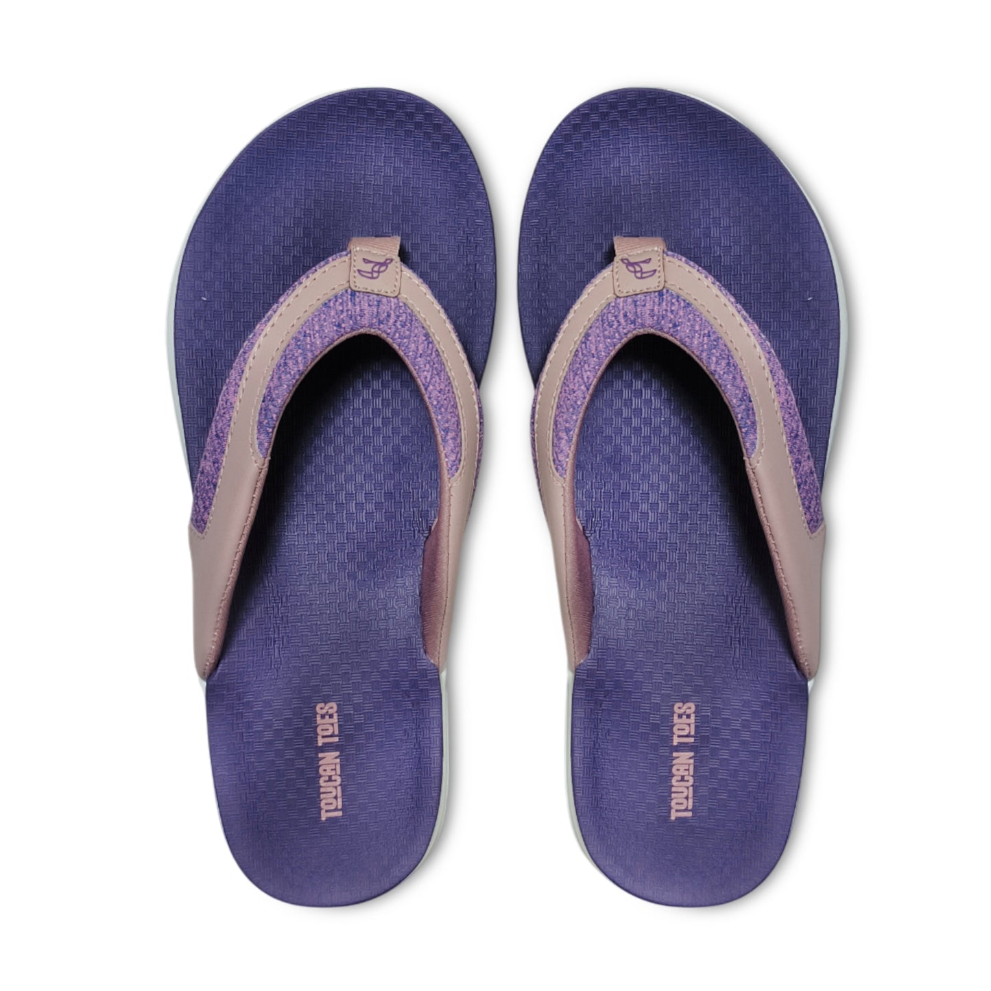 Purple and pink Toucan Toes flip-flop sandals with textured footbed and fabric straps
