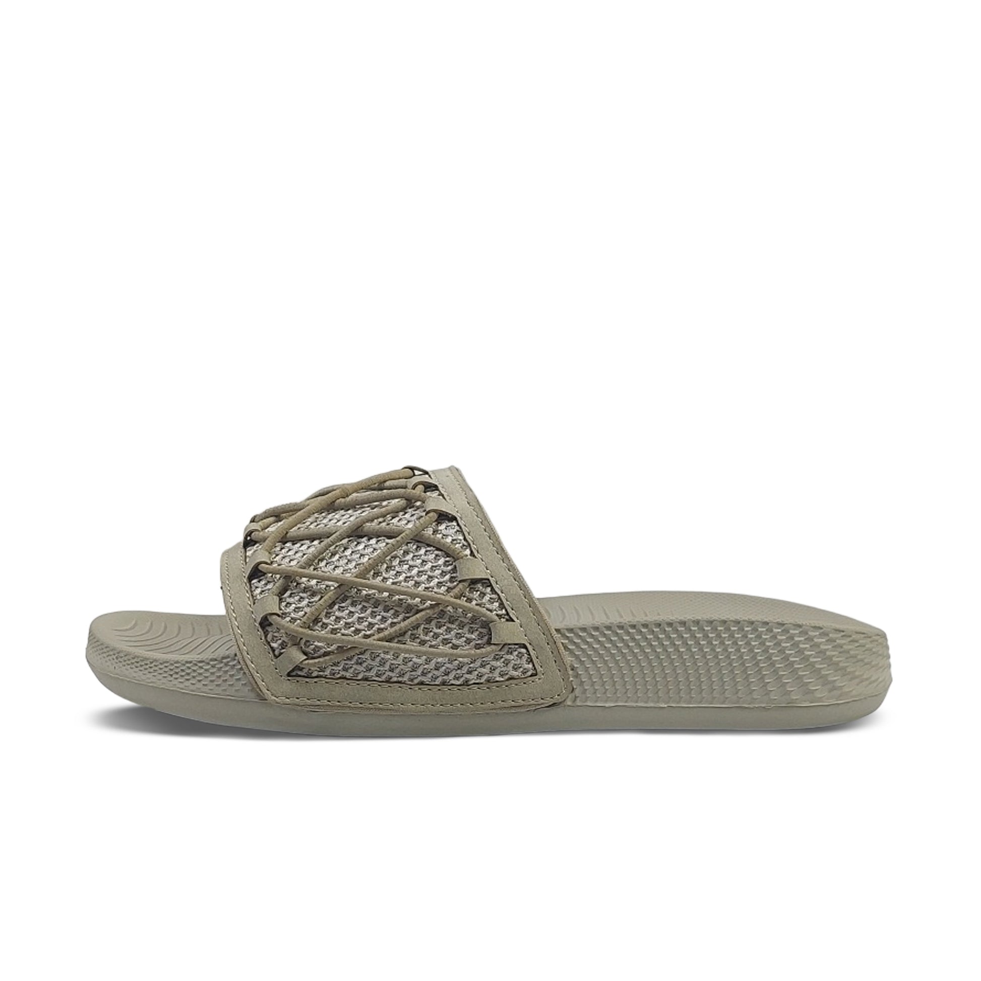 Toucantoes beige slide sandal with breathable mesh strap and textured sole, side view