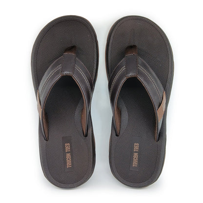 Pair of brown Toucan Toes men's flip flops with cushioned soles on white background