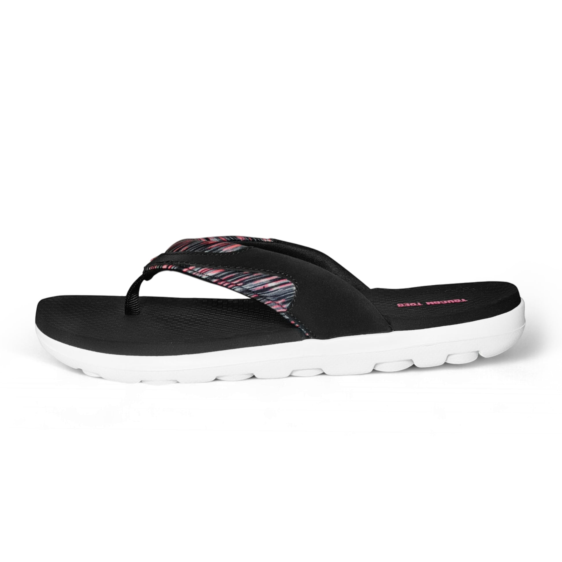 Black and white cushioned flip flop sandal with pink patterned strap and textured footbed