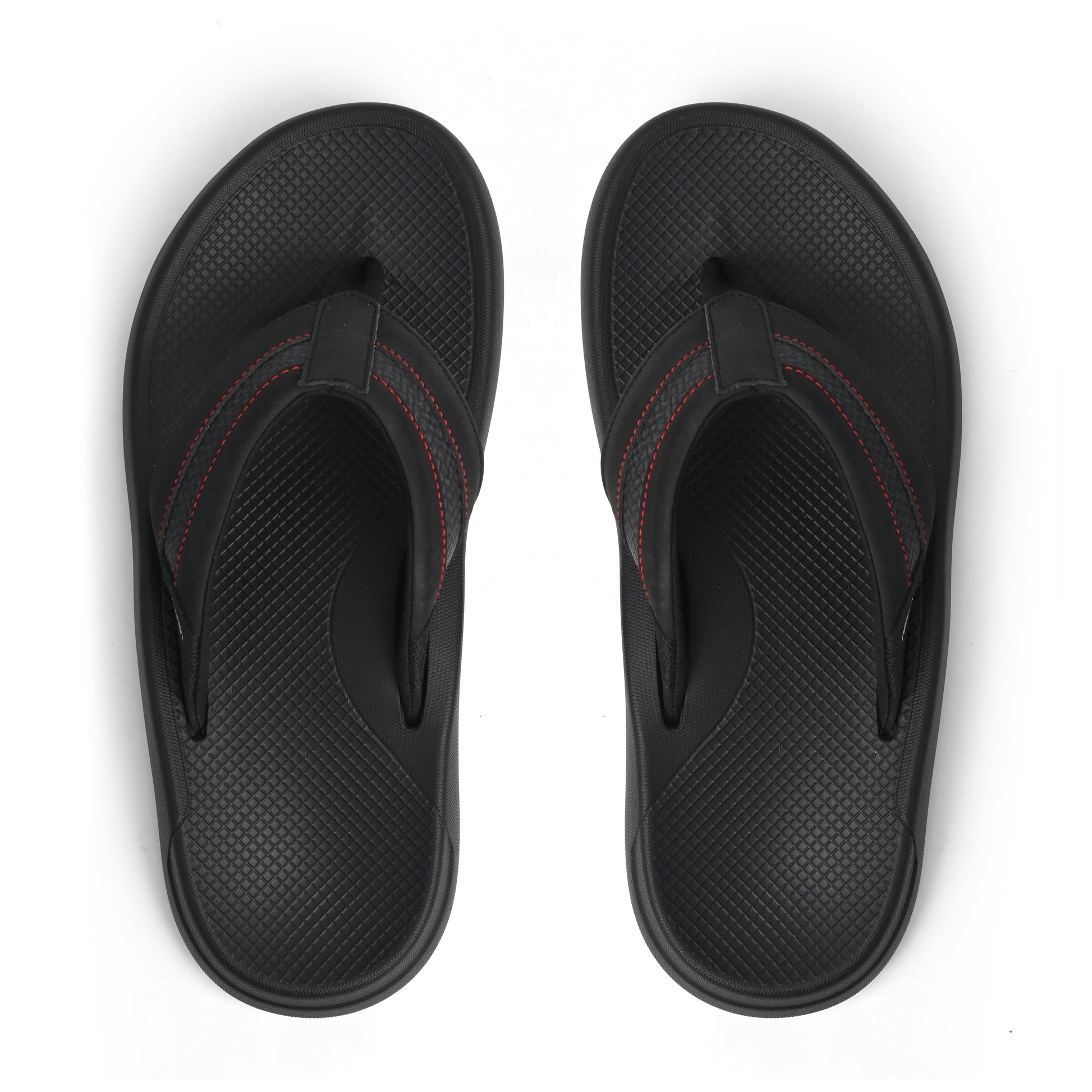 Pair of black textured flip-flop sandals with red stitching on white background