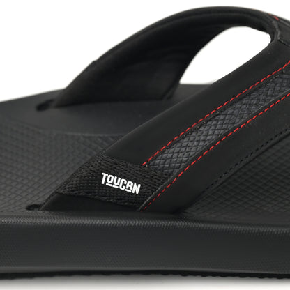 Black Toucan flip flop sandal with textured sole and red stitching details