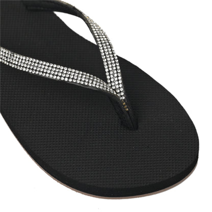 Black Toucan Toes flip-flop with sparkling rhinestone straps, stylish and trendy footwear.