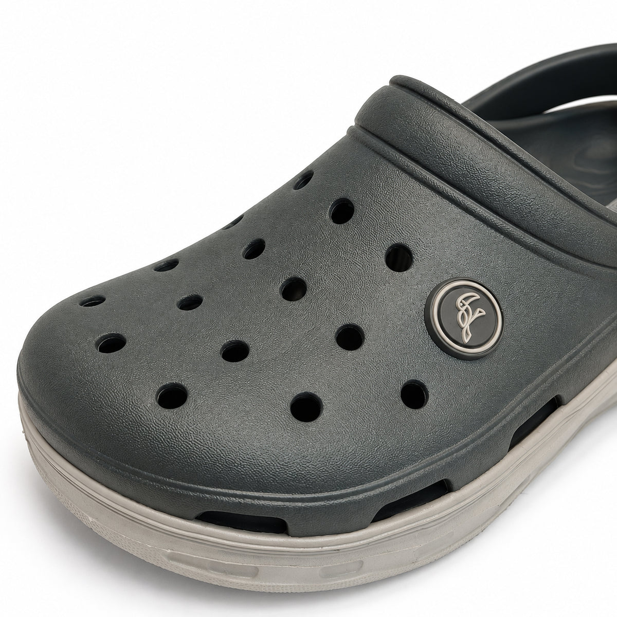 Close-up of the Toucantoes Frank grey clog upper with ventilation holes