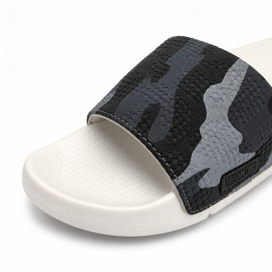 Close-up of the Toucantoes Troy white slider strap and soft footbed