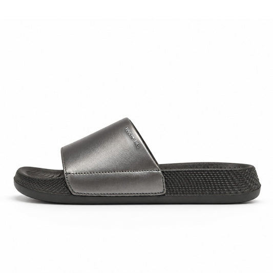 Toucantoes Sophie women's slides in black, side view showing the cushioned sole