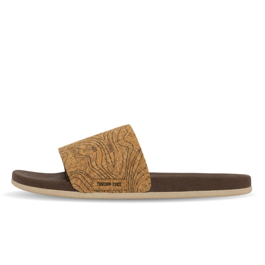 Toucantoes Arizona men's slippers in brown, side view showing the cushioned sole
