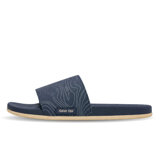 Toucantoes Arizona men's slippers in navy, side view showing the cushioned sole