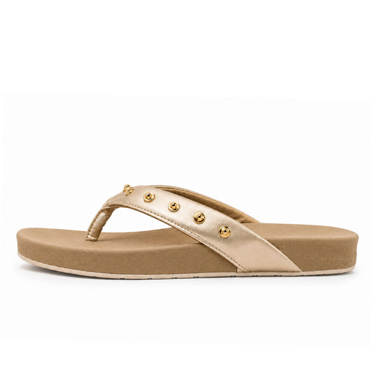 Toucantoes Dome women's flip-flops in beige, side view showing the cushioned sole