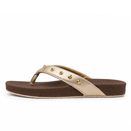 Toucantoes Dome women's flip-flops in brown, side view showing the cushioned sole
