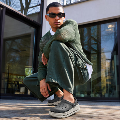 Man wearing Toucantoes Frank grey clogs, lifestyle shot