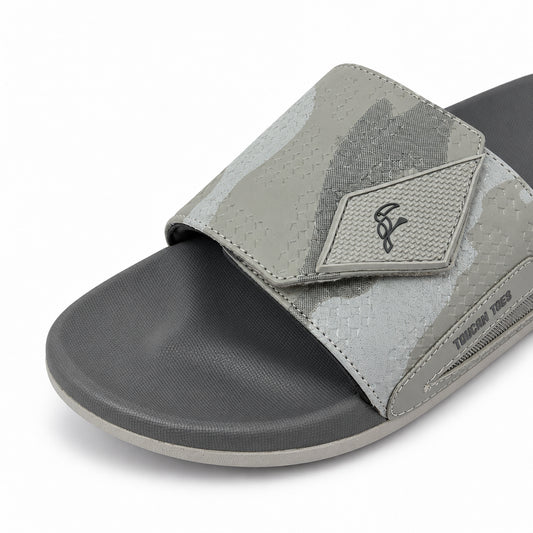 Close-up of the Toucantoes Sniper grey slide strap and soft footbed