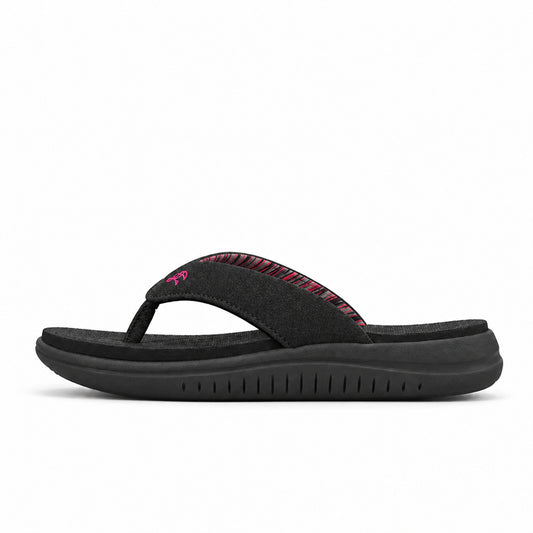 Toucantoes Ziva women's flip-flops in black, side view showing the cushioned sole